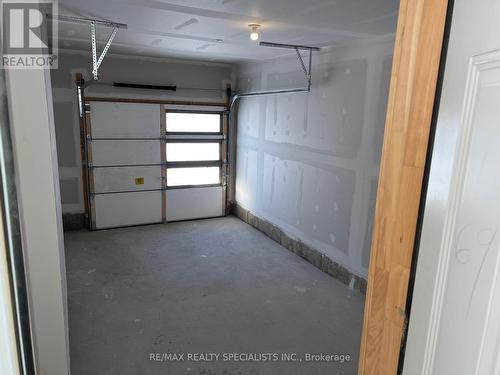 2 Prudhoe Terrace, Barrie, ON - Indoor Photo Showing Garage