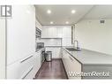 5728 Berton Avenue, Vancouver, BC  - Indoor Photo Showing Kitchen With Double Sink With Upgraded Kitchen 