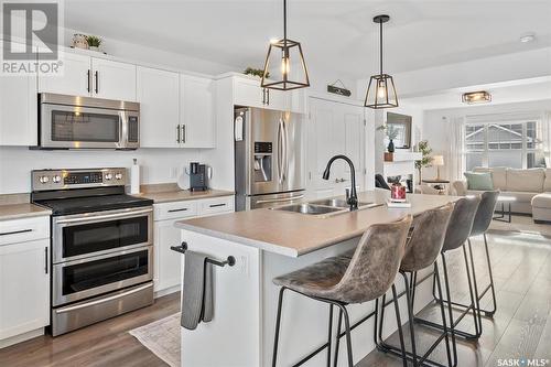 734 Kolynchuk Court, Saskatoon, SK - Indoor Photo Showing Kitchen With Stainless Steel Kitchen With Double Sink With Upgraded Kitchen