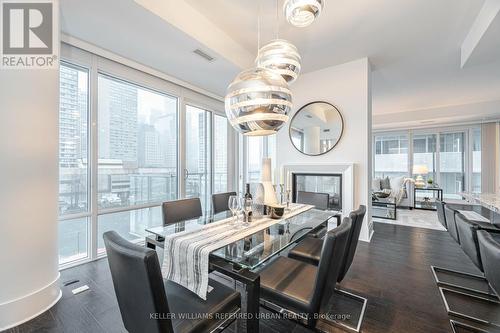 603 - 29 Queens Quay E, Toronto, ON - Indoor Photo Showing Dining Room With Fireplace