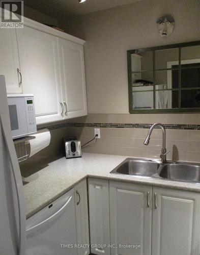 52 - 120 Finholm Street N, Parksville, BC - Indoor Photo Showing Kitchen With Double Sink