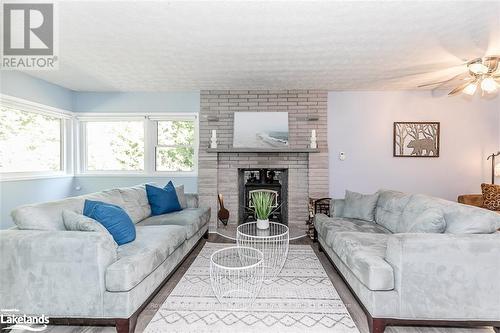 229 Bruce Road 23, Kincardine, ON - Indoor Photo Showing Living Room With Fireplace