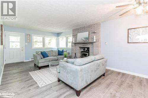 229 Bruce Road 23, Kincardine, ON - Indoor Photo Showing Living Room With Fireplace