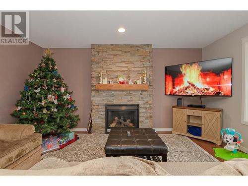 110 Red Rock Crescent, Enderby, BC - Indoor Photo Showing Living Room With Fireplace