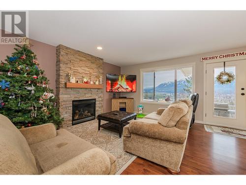 110 Red Rock Crescent, Enderby, BC - Indoor Photo Showing Living Room With Fireplace