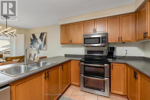 143 Porchlight Road, Brampton, ON - Indoor Photo Showing Kitchen With Double Sink