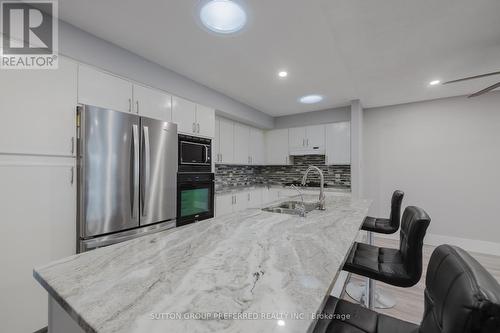 40 Seres Drive, Tillsonburg, ON - Indoor Photo Showing Kitchen With Stainless Steel Kitchen With Double Sink