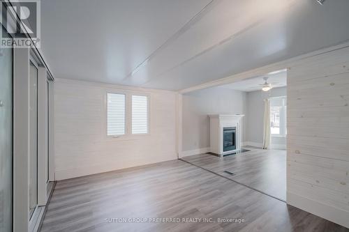 40 Seres Drive, Tillsonburg, ON - Indoor Photo Showing Other Room With Fireplace