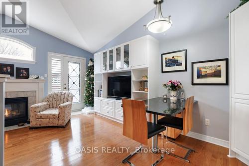 62 Waterthrush Crescent, Ottawa, ON - Indoor Photo Showing Living Room With Fireplace