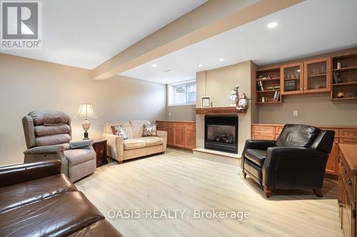 62 Waterthrush Crescent, Ottawa, ON - Indoor Photo Showing Living Room With Fireplace