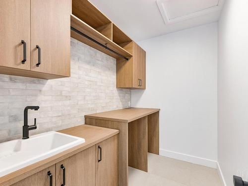 Salle de lavage - 1408 Place Des Vignes, Piedmont, QC - Indoor Photo Showing Kitchen