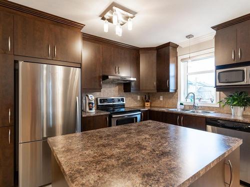 Kitchen - 3570  - 201 Boul. Pie-Ix, Laval (Duvernay), QC - Indoor Photo Showing Kitchen With Double Sink