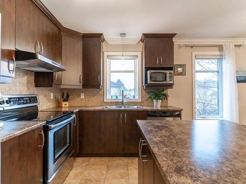 Kitchen - 3570  - 201 Boul. Pie-Ix, Laval (Duvernay), QC - Indoor Photo Showing Kitchen With Double Sink