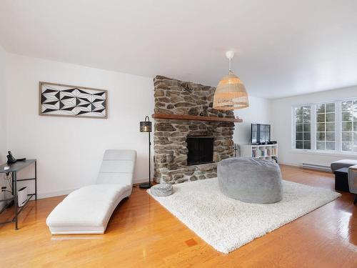 Living room - 352 Route 132, Sainte-Barbe, QC - Indoor Photo Showing Living Room With Fireplace