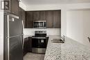 2207 - 349 Rathburn Road W, Mississauga, ON  - Indoor Photo Showing Kitchen With Double Sink 