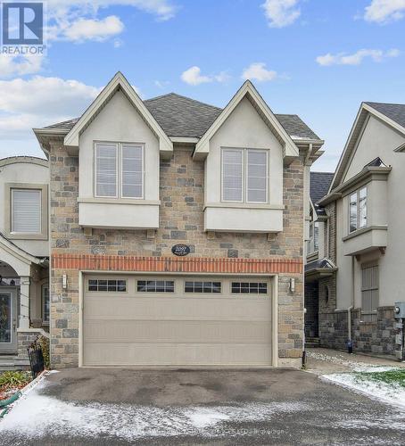 2097 Tovell Drive, Oakville, ON - Outdoor With Facade