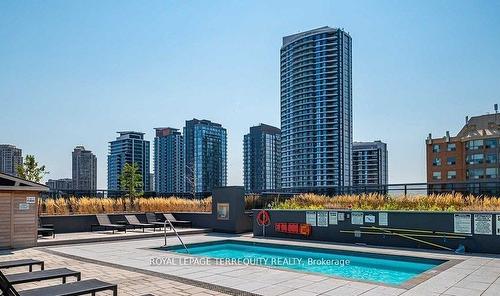 1720-8 Nahani Way, Mississauga, ON - Outdoor With In Ground Pool