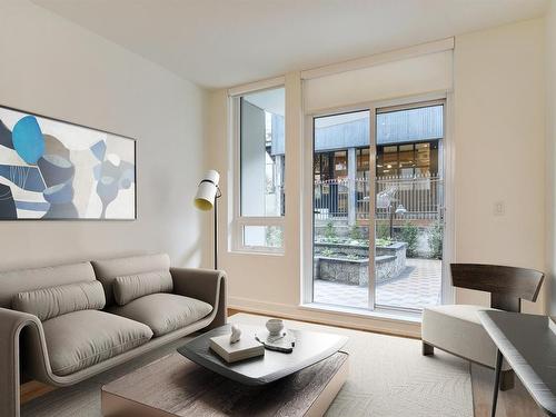 401-1628 Store St, Victoria, BC - Indoor Photo Showing Living Room