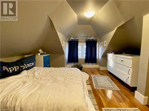 Bedroom featuring wood-type flooring and lofted ceiling - 507 Victoria Street N Unit# 2, Kitchener, ON - Indoor Photo Showing Bedroom