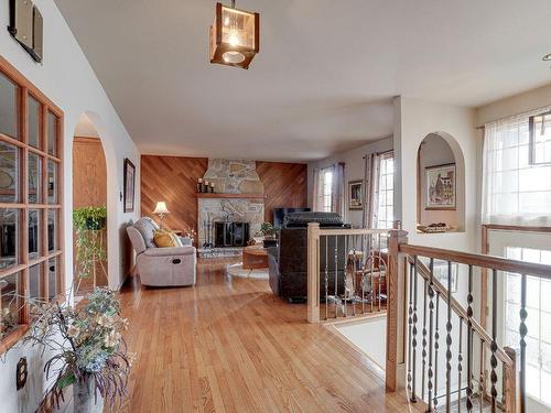 Living room - 97 Rue Beauchesne, Repentigny (Repentigny), QC - Indoor Photo Showing Other Room With Fireplace