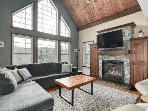 Salon - 270 Rue Des Agates, Saint-Côme, QC - Indoor Photo Showing Living Room With Fireplace