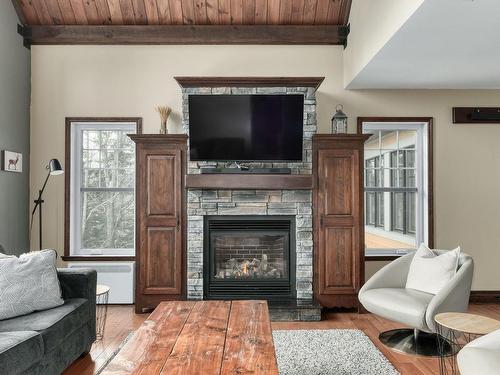 Salon - 270 Rue Des Agates, Saint-Côme, QC - Indoor Photo Showing Living Room With Fireplace