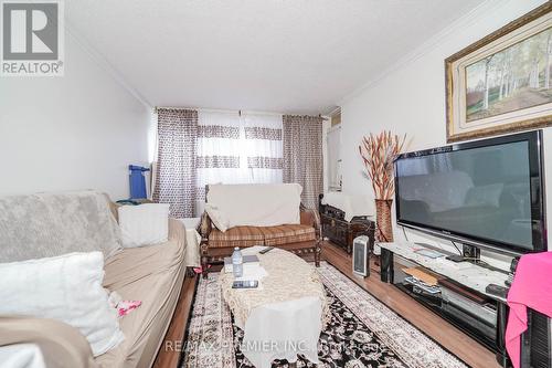 # 110 - 340 Dixon Road, Toronto, ON - Indoor Photo Showing Living Room