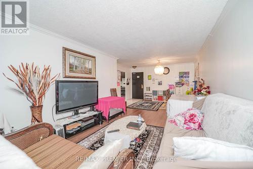 # 110 - 340 Dixon Road, Toronto, ON - Indoor Photo Showing Living Room