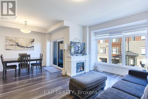 59 - 575 Woodward Avenue, Hamilton, ON - Indoor Photo Showing Living Room With Fireplace