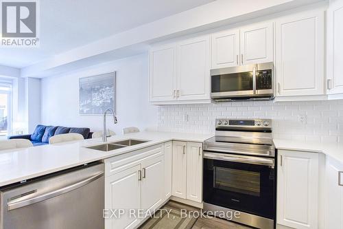 59 - 575 Woodward Avenue, Hamilton, ON - Indoor Photo Showing Kitchen With Double Sink