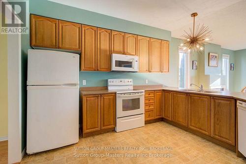 44 Country Club Drive, Loyalist (Bath), ON - Indoor Photo Showing Kitchen With Double Sink