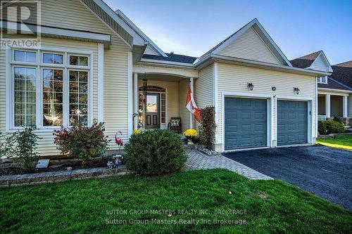 44 Country Club Drive, Loyalist (Bath), ON - Outdoor With Facade