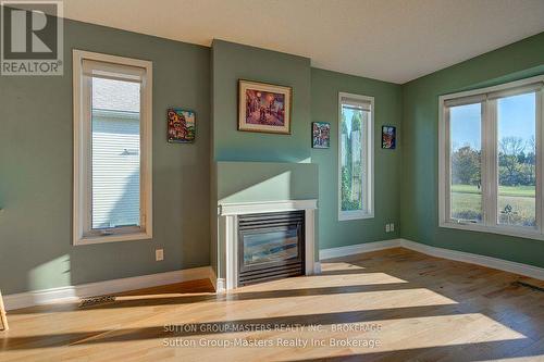 44 Country Club Drive, Loyalist (Bath), ON - Indoor Photo Showing Other Room With Fireplace