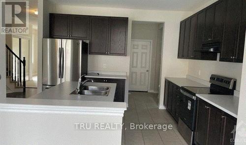 717 Brittanic Road N, Ottawa, ON - Indoor Photo Showing Kitchen With Double Sink