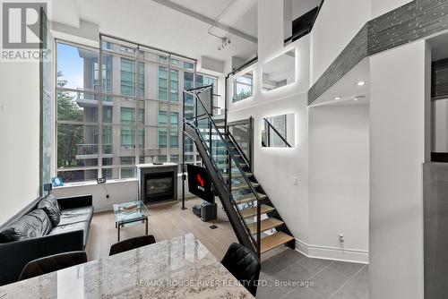 227 - 300 Manitoba Street, Toronto, ON - Indoor Photo Showing Other Room With Fireplace