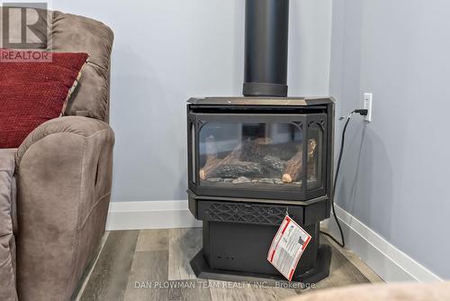 19 Burnett Shore Road, Kawartha Lakes, ON - Indoor With Fireplace