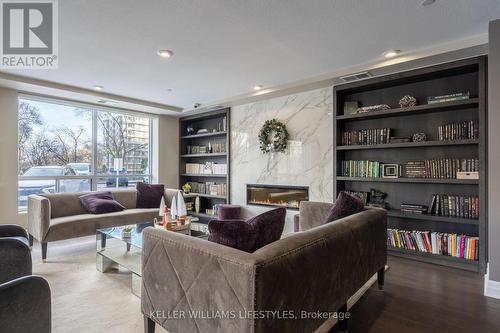 313 - 1200 Commissioners Road W, London, ON - Indoor Photo Showing Living Room With Fireplace