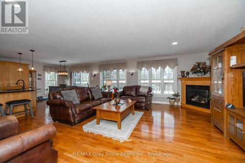 319586 Grey Road 1 Road, Georgian Bluffs, ON - Indoor Photo Showing Living Room With Fireplace