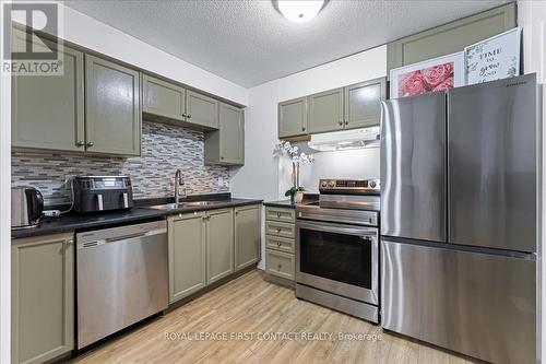 I7 - 63 Ferris Lane, Barrie, ON - Indoor Photo Showing Kitchen With Stainless Steel Kitchen With Double Sink