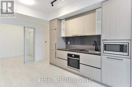 2311 - 10 Graphophone Grove, Toronto, ON - Indoor Photo Showing Kitchen