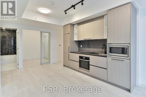 2311 - 10 Graphophone Grove, Toronto, ON - Indoor Photo Showing Kitchen