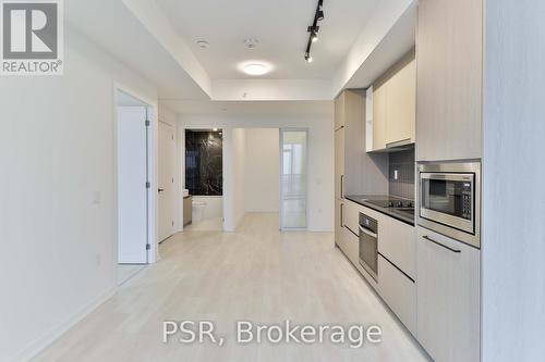 2311 - 10 Graphophone Grove, Toronto, ON - Indoor Photo Showing Kitchen