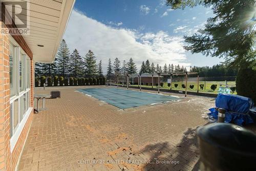 207 - 1 Heritage Way, Kawartha Lakes (Lindsay), ON - Outdoor With In Ground Pool