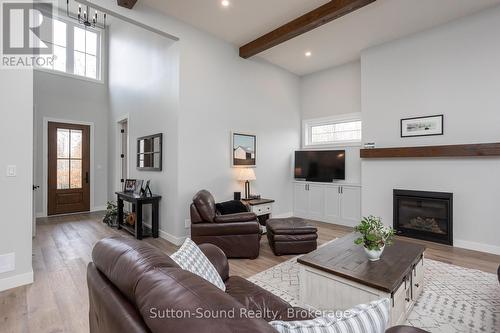 150 Spencer Avenue, Georgian Bluffs, ON - Indoor Photo Showing Living Room With Fireplace