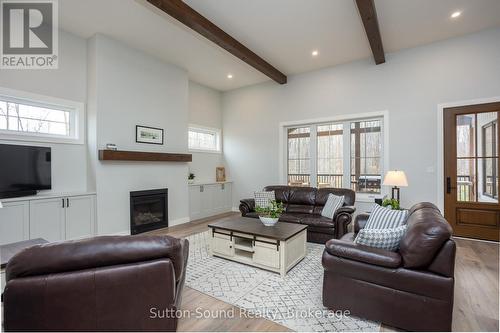 150 Spencer Avenue, Georgian Bluffs, ON - Indoor Photo Showing Living Room With Fireplace