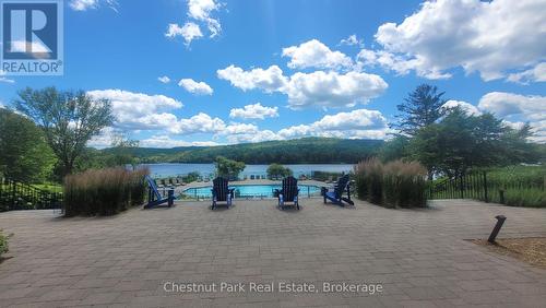 330 - 25 Pen Lake Point Road, Huntsville (Chaffey), ON - Outdoor With Body Of Water With View