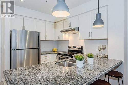 321 - 1077 Gordon Street, Guelph (Hanlon Creek), ON - Indoor Photo Showing Kitchen With Double Sink With Upgraded Kitchen