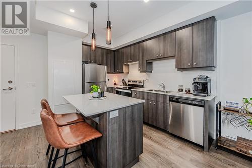 251 Northfield Drive Unit# 418, Waterloo, ON - Indoor Photo Showing Kitchen With Stainless Steel Kitchen With Double Sink With Upgraded Kitchen