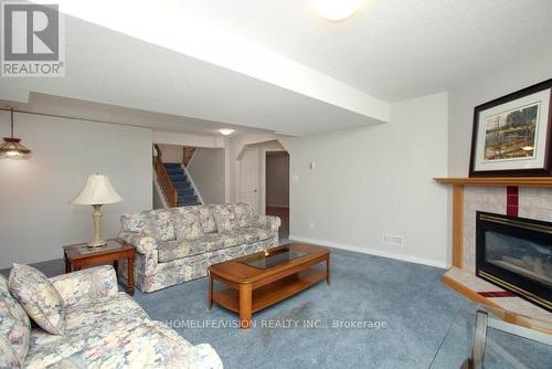 1105 Tillison Avenue, Cobourg, ON - Indoor Photo Showing Living Room With Fireplace