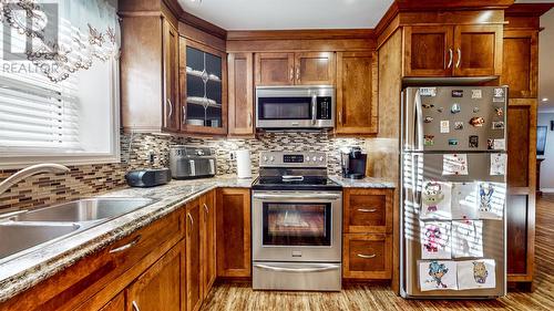 1 Wesbill Place, Pouch Cove, NL - Indoor Photo Showing Kitchen With Double Sink